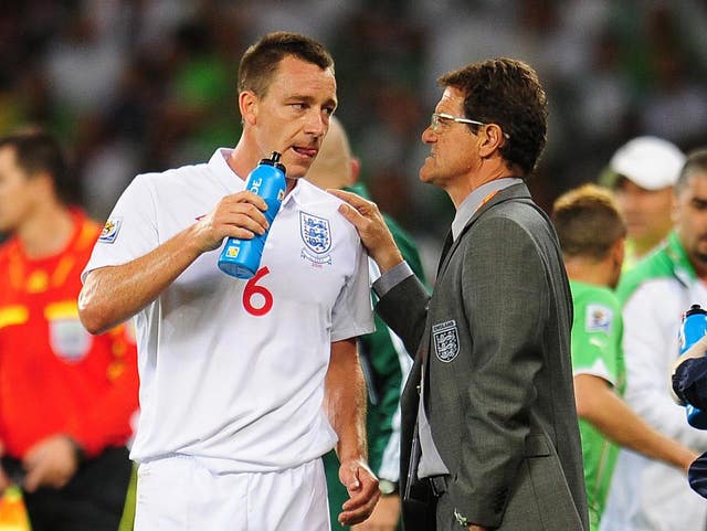 England manager Fabio Capello (left) talks to John Terry
