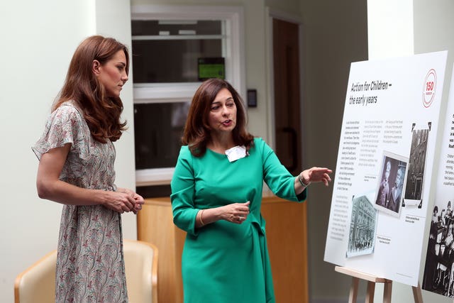 The Duchess of Cambridge during a visit to a Royal Photographic Society workshop with Action for Children