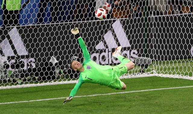 England goalkeeper Jordan Pickford saves a penalty from Colombia's Carlos Bacca during the 2018 World Cup (Aaron Chown/PA)