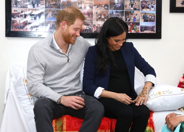 The Duke and Duchess of Sussex during a Henna ceremony