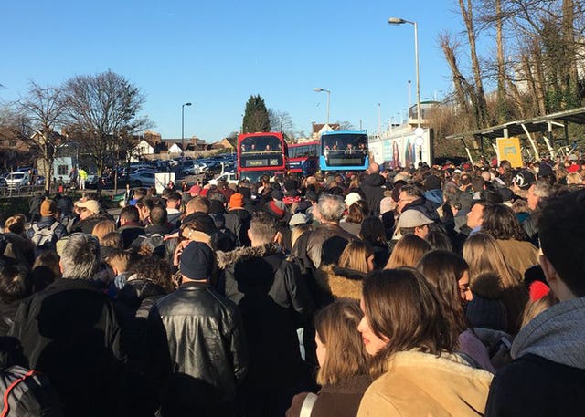An overcrowded rail replacement service caused crowds to bottleneck (Melany Dominguez/PA)