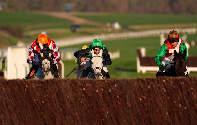 Eva’s Oskar(left) during the Dahlbury Handicap Chase at Cheltenham