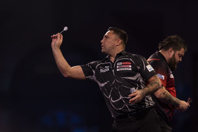 Gerwyn Price and Micheal Smith in action at the William Hill PDC World Darts Championship