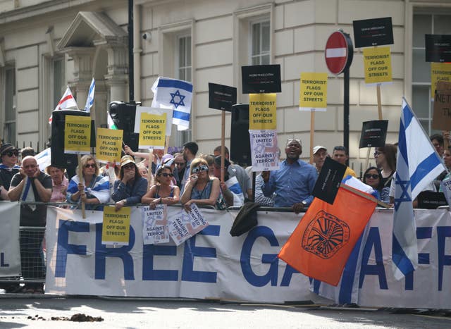 Pro-Israeli counter protesters stood behind a banner reading 'Free Gaza from Hamas'