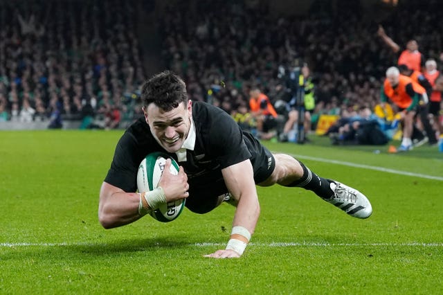 New Zealand’s Will Jordan scores a try against Ireland