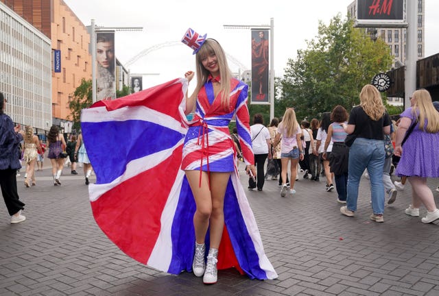 A fan wearing a dress in the colours of the Union flag