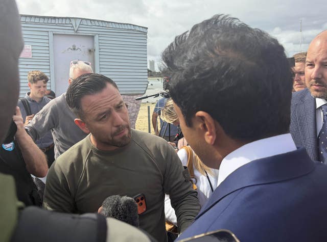 Patriot Platform founder Daniel Thomas, known as Danny Tommo speaking to Reform UK home affairs spokesman Zia Yusuf in Portsmouth 