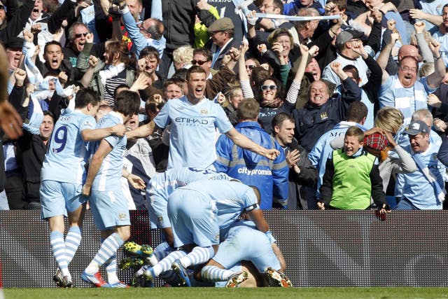 Manchester City celebrate Sergio Aguero's title-clinching goal