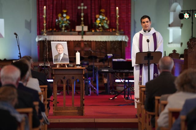 Rev Tom Loh leads a vigil (Kirsty O'Connor/PA)