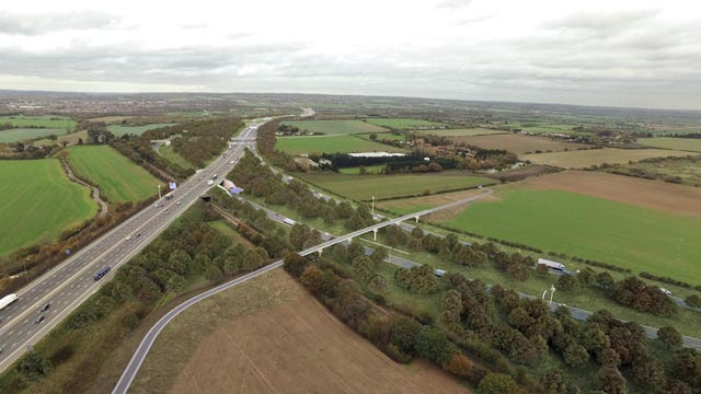 Undated handout artist's impression issued by Highways England of how the Lower Thames Crossing junction with the M25 in Essex will look (Highways England/PA)
