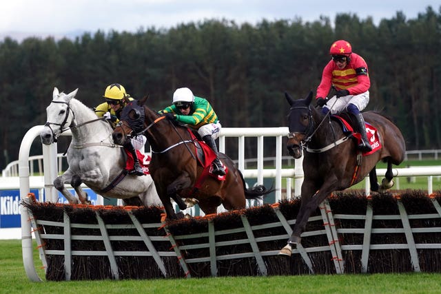 Klassical Dream (right) clears the final hurdle on his way to winning the Ladbrokes Champion Stayers Hurdle during day three of the Punchestown Festival