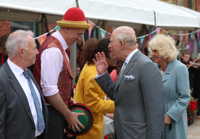 The King and Queen meet performers as they attend an event to mark Fleadh Cheoil na hEireann coming to Belfast in August, at Thompson Dock, Belfast