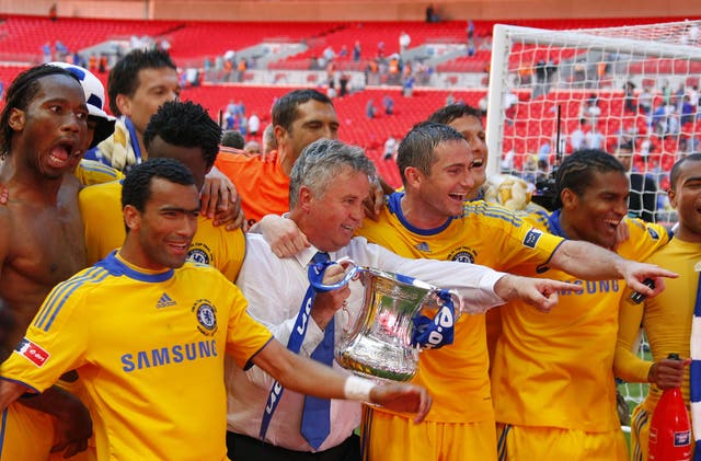 Guus Hiddink, centre, celebrates FA Cup success with his Chelsea team