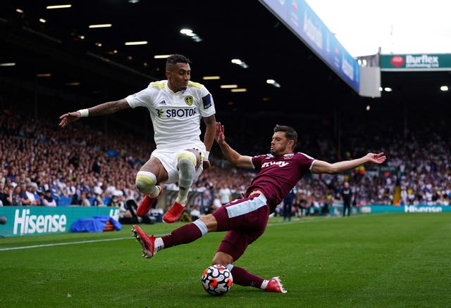 Aaron Cresswell, right, could be back for West Ham in north London (Zac Goodwin/PA)