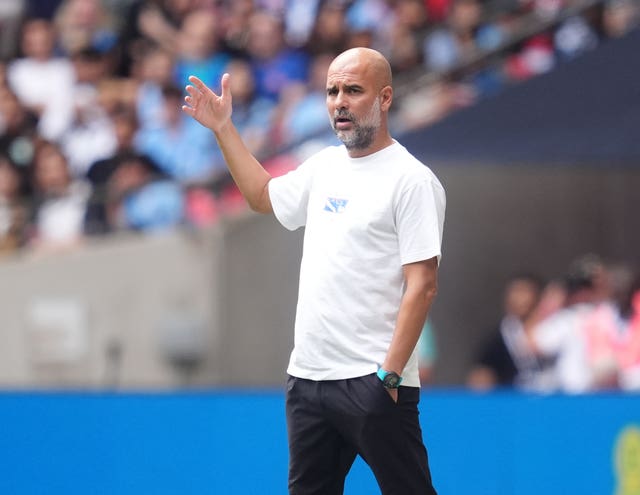 Pep Guardiola gives instructions